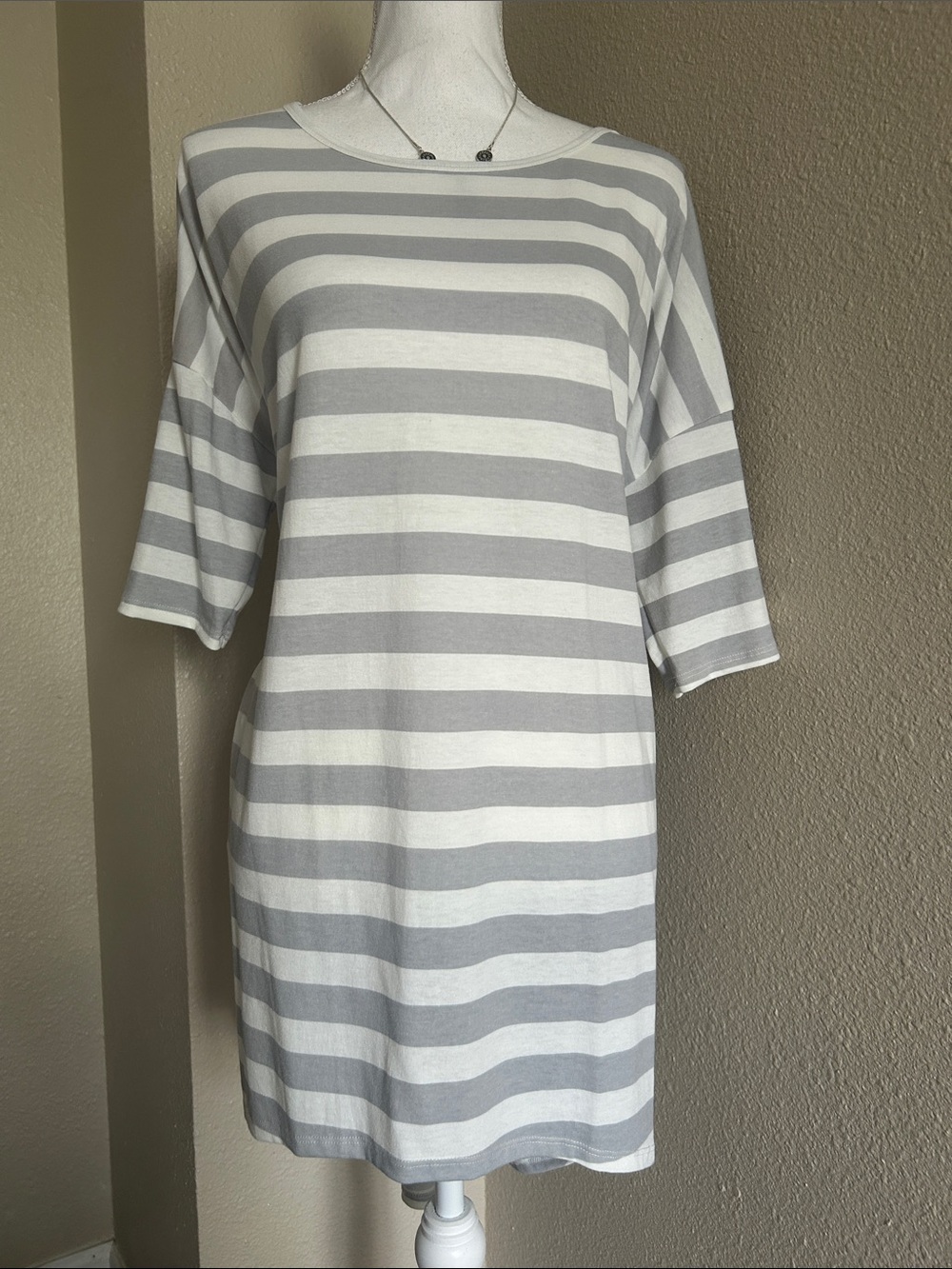 LuLaRoe Gray & White Striped High Low Tee.